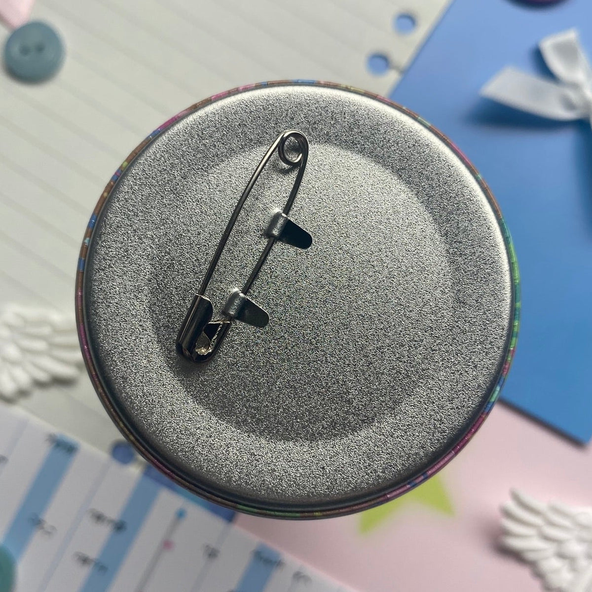 Metal back of button badge and safety pin