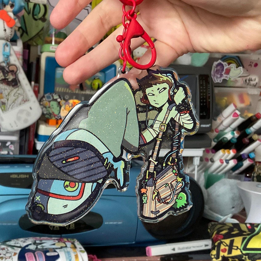 Large keychain epoxy glitter of Lidia jumping on red chain clip