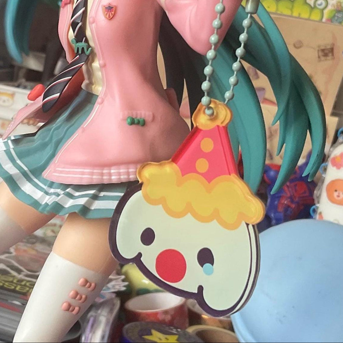 clown key chain on light blue chain