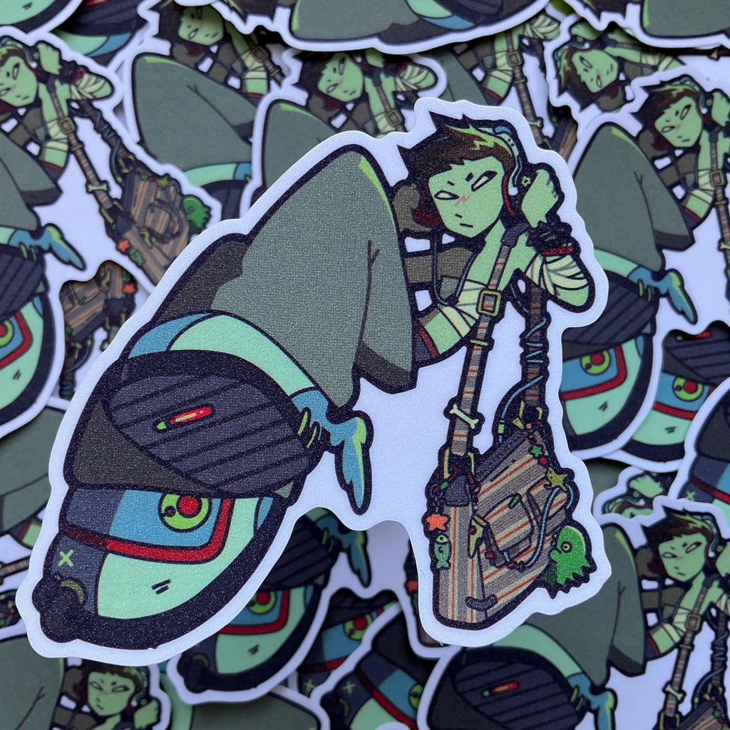 giltter lidia sticker in front of many more of the same sticker