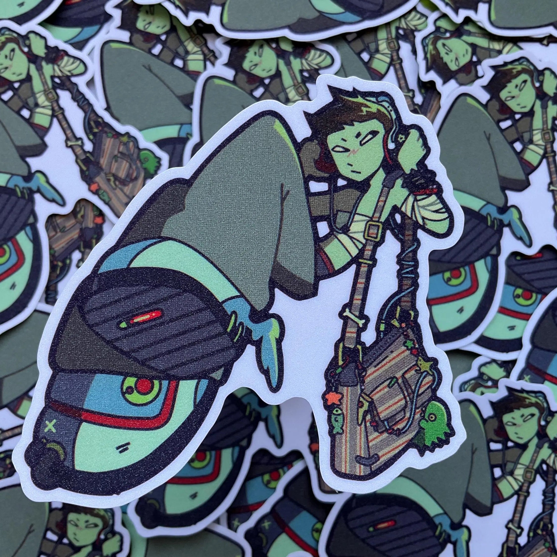 giltter lidia sticker in front of many more of the same sticker