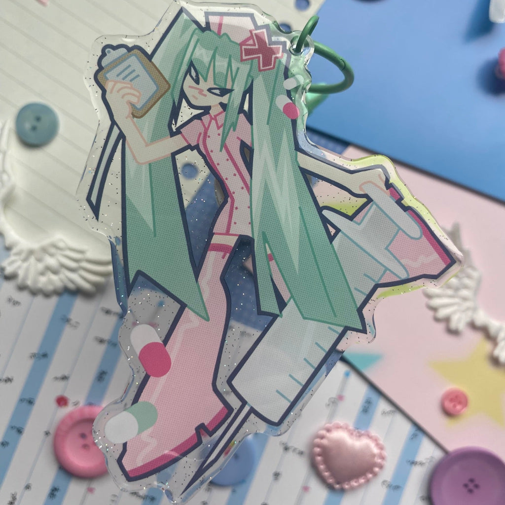 Turquoise ponytailed pink nurse singer character on epoxy mint green keychain clasp