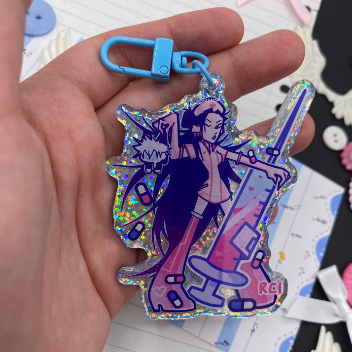 pink nurse keychain held in a hand