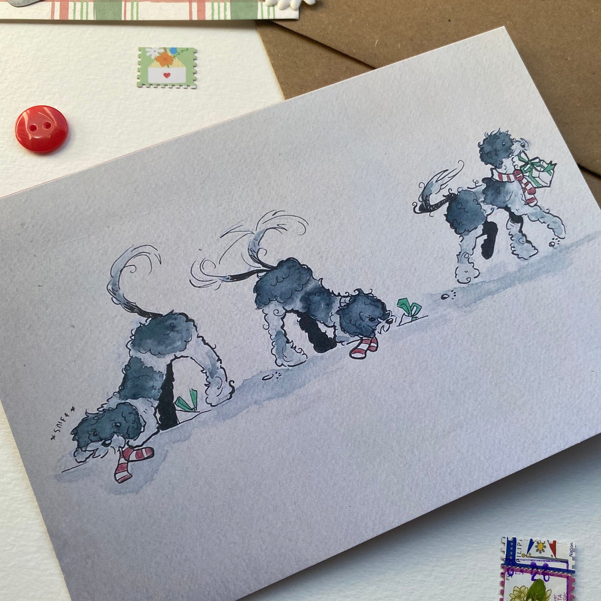 greetings card with dog in scarf hunting for presents