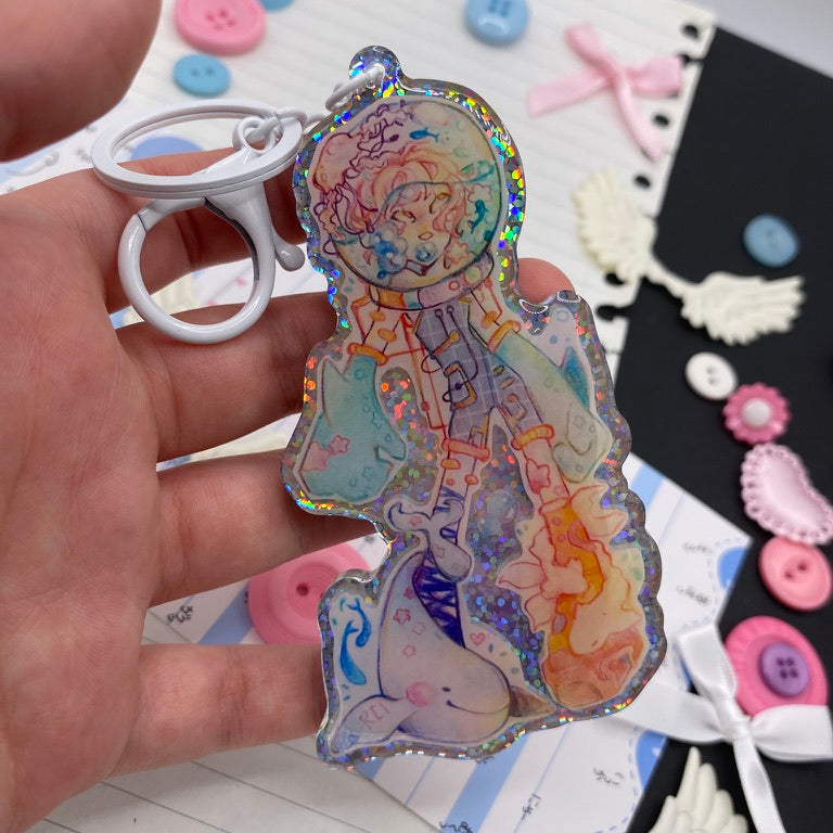 Sea Astronaut keychain in hand