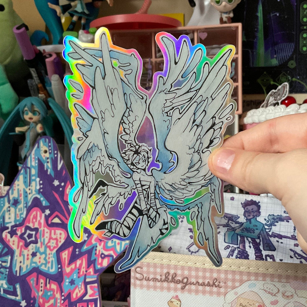 winged pilot holo sticker in hand
