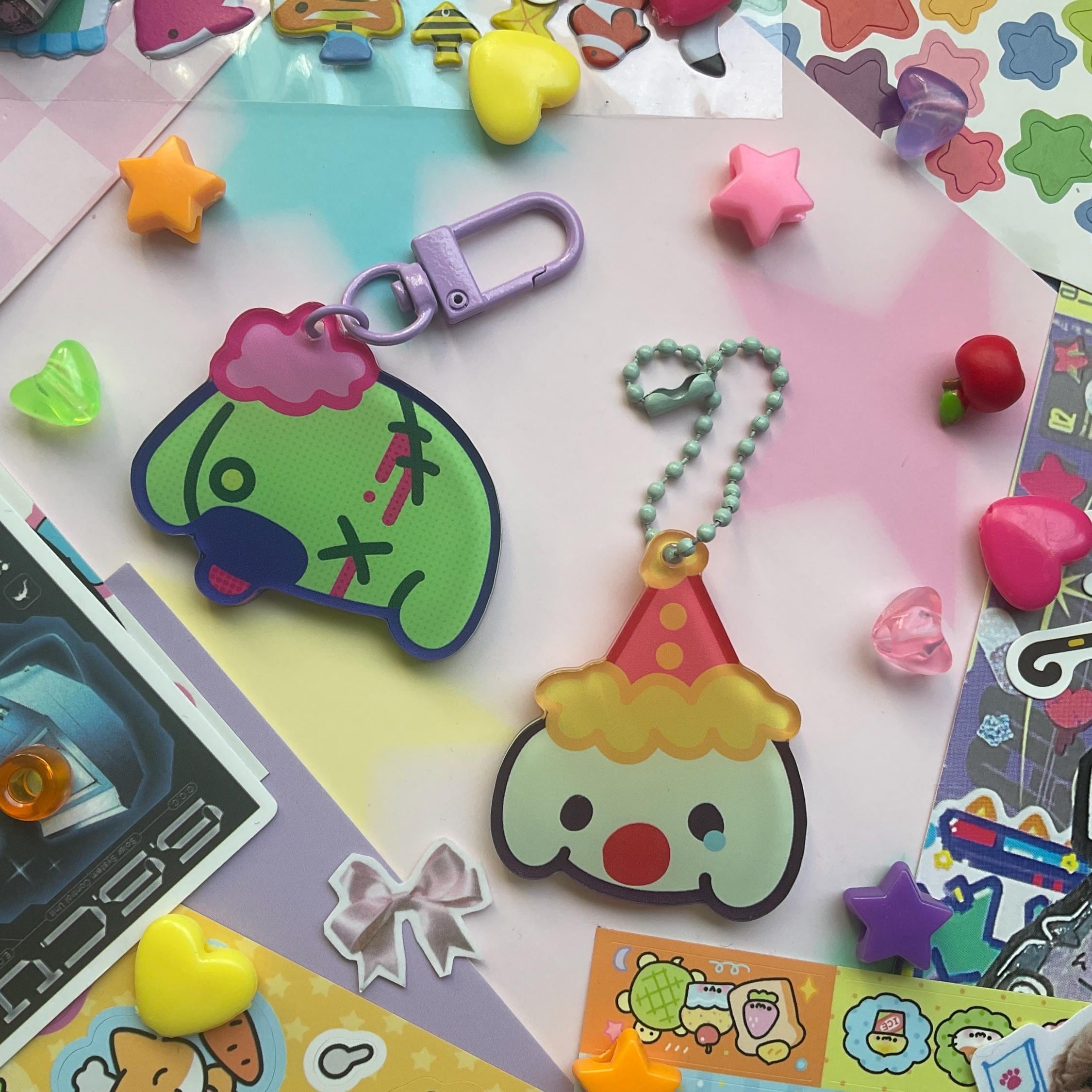 green zombi and clown dog head keychains